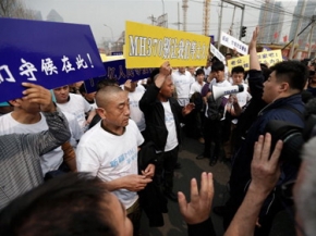 رد فعل أقارب ركاب الطائرة الماليزية