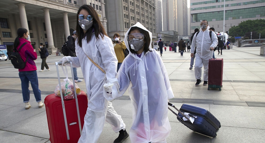 السلطات الصينية في ووهان تخضع العاملين لفحوصات إجبارية للكشف عن إصابتهم كورونا