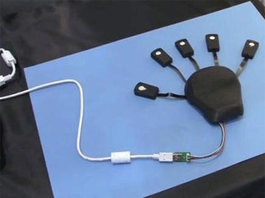 شركة يابانية تطوِّر فأرة على هيئة كف يد كاملة