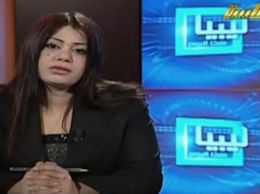 هالة المصراتي تسبُّ معمر القذافي وتؤيد المسلحين 