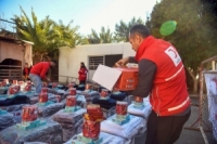 الهلال الأحمر العربي السوري يوزع مساعدات إنسانية في دمشق بالتعاون مع ‏الهلال الأحمر التركي